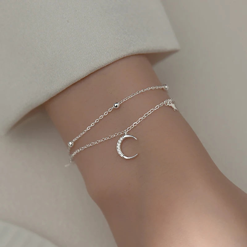 Apportez une touche céleste à vos tenues avec notre bracelet Star & Moon pour femme.