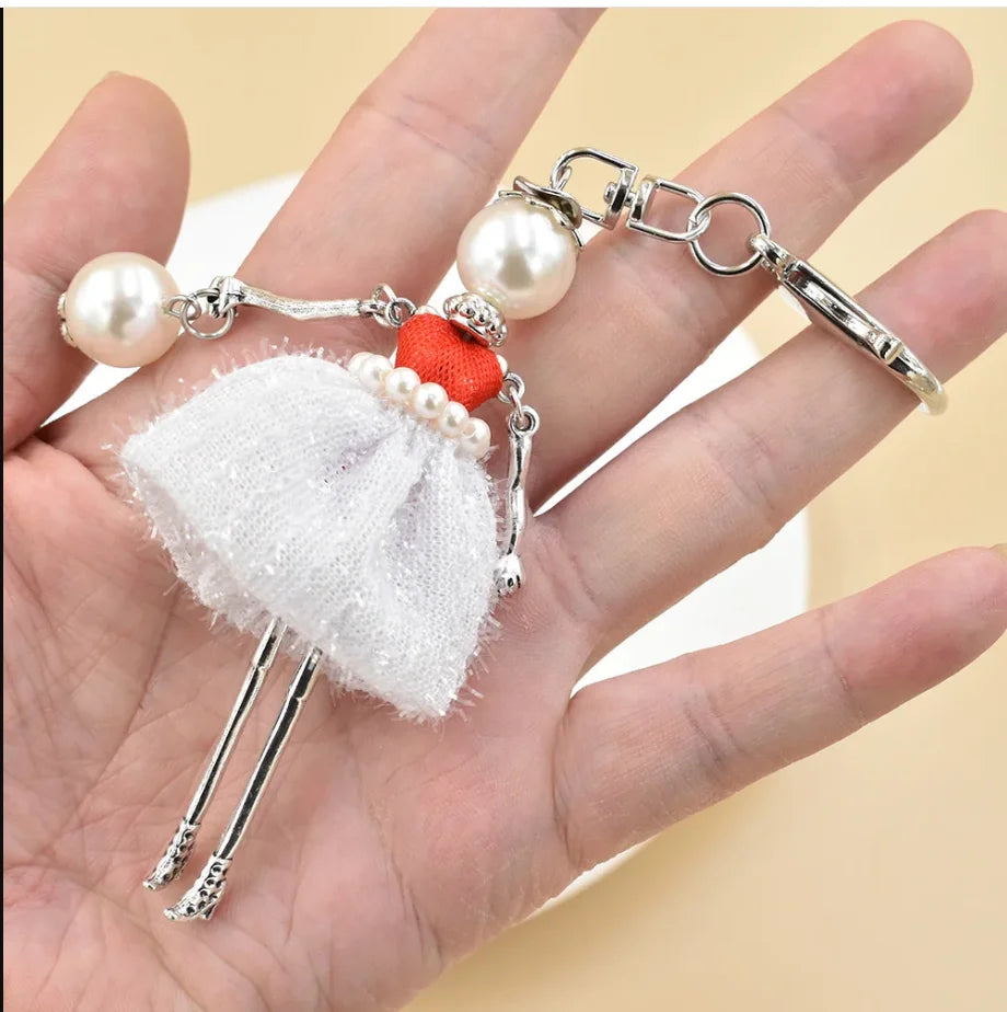 "Porte-clés poupée fait main – YL, charm mignon pour femmes, voiture, sac à main, bijou tendance" ✅