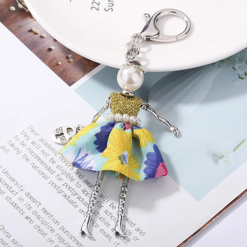 "Porte-clés poupée fait main – YL, charm mignon pour femmes, voiture, sac à main, bijou tendance" ✅