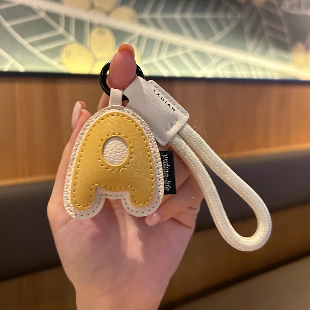 ✨ Porte-Clés en Cuir Tressé avec Initiale | Bijou de Sac, Bracelet et Accessoire pour Femme & Homme ✨