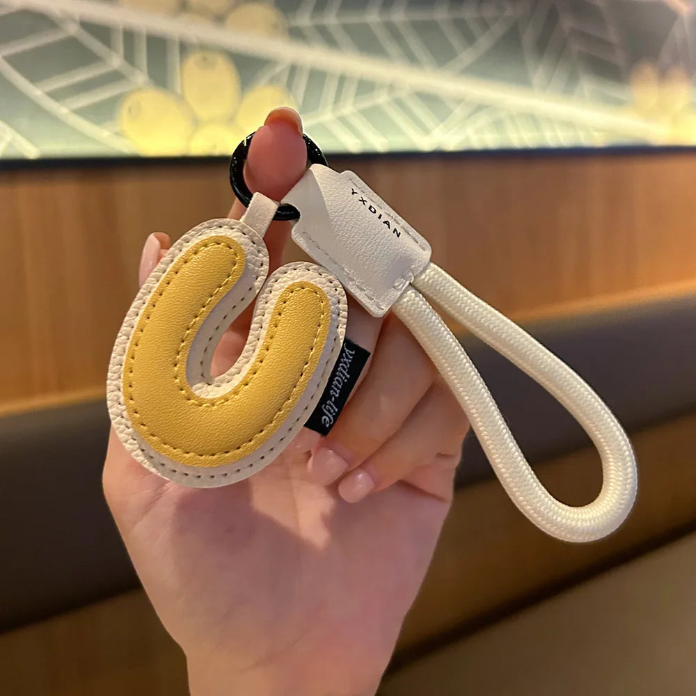 ✨ Porte-Clés en Cuir Tressé avec Initiale | Bijou de Sac, Bracelet et Accessoire pour Femme & Homme ✨