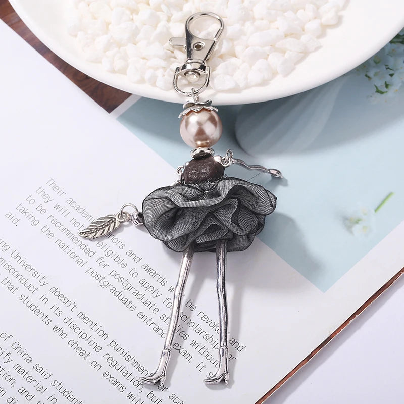 "Porte-clés poupée fait main – YL, charm mignon pour femmes, voiture, sac à main, bijou tendance" ✅