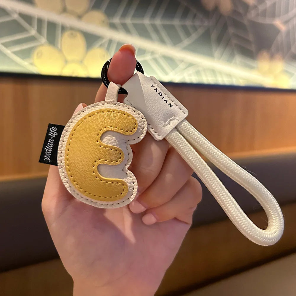✨ Porte-Clés en Cuir Tressé avec Initiale | Bijou de Sac, Bracelet et Accessoire pour Femme & Homme ✨